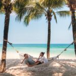 Digitale nomader på stranden