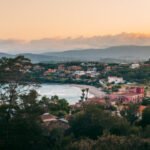 Solnedgang over stranden i Arbatax